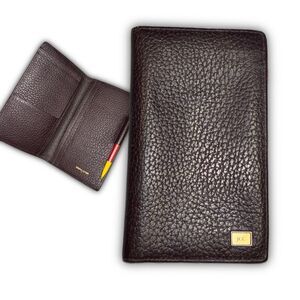 JCC purple leather planner booklet.